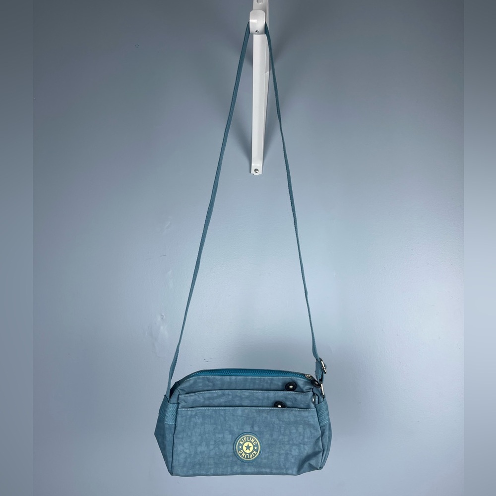 Kipling blue zipper pouch adjustable crossbody